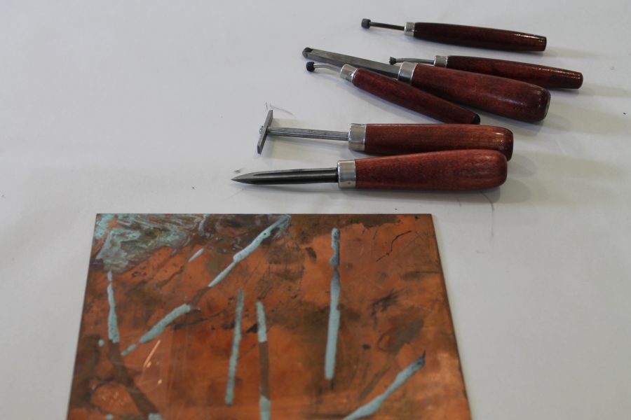 The basic printmaker's toolbox: varying needles and a plate. 