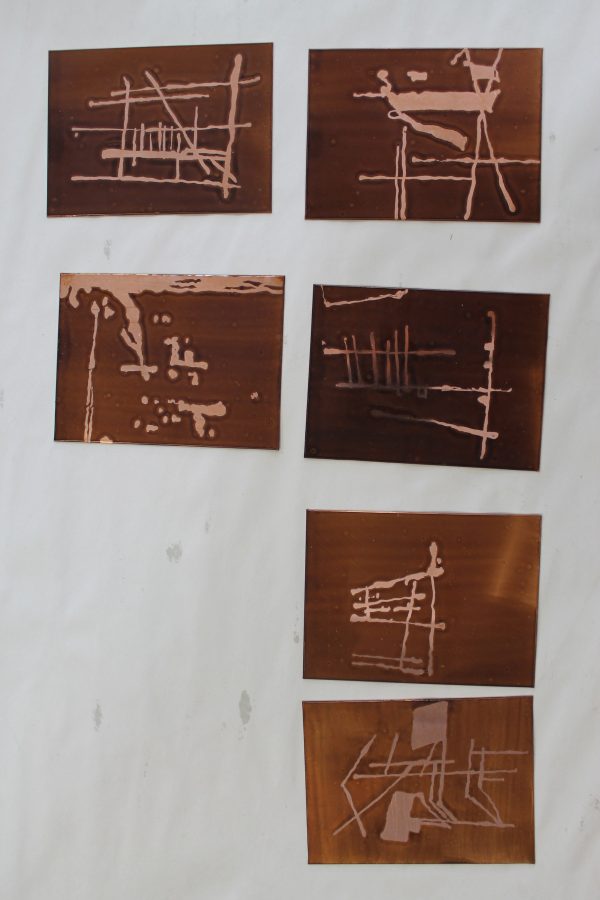 The sugar lift process is complete. The next step is adding hardground to the plates. 