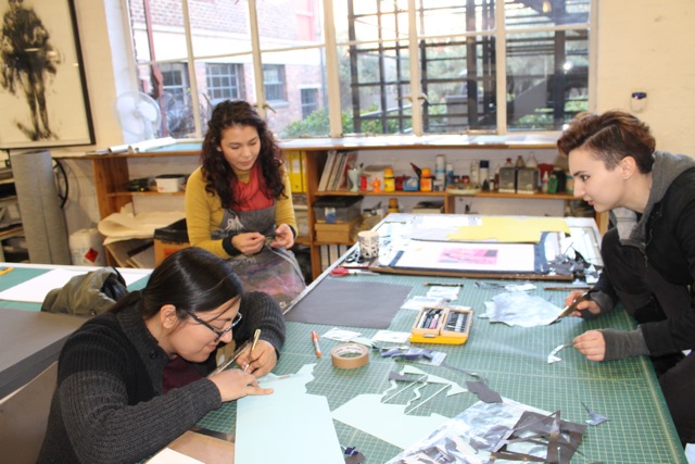 Joanna and Ryn get stuck in under the guidance of DKW printer Kim-Lee Loggenburg