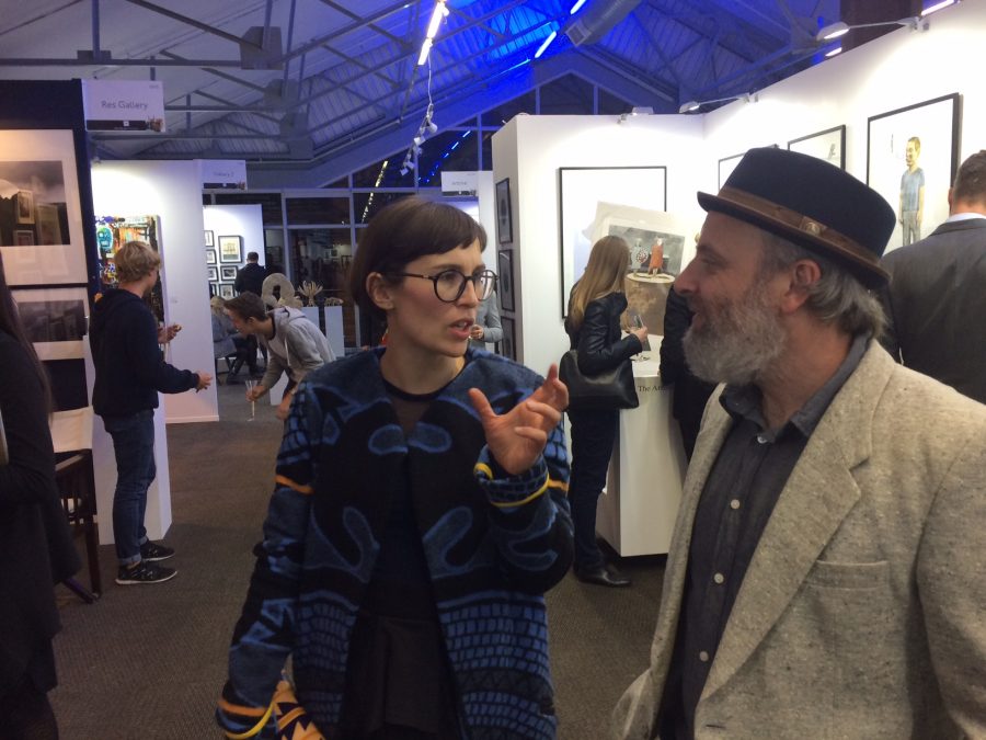 DKW master printer Jill Ross chats art with artist Richard Penn by our booth